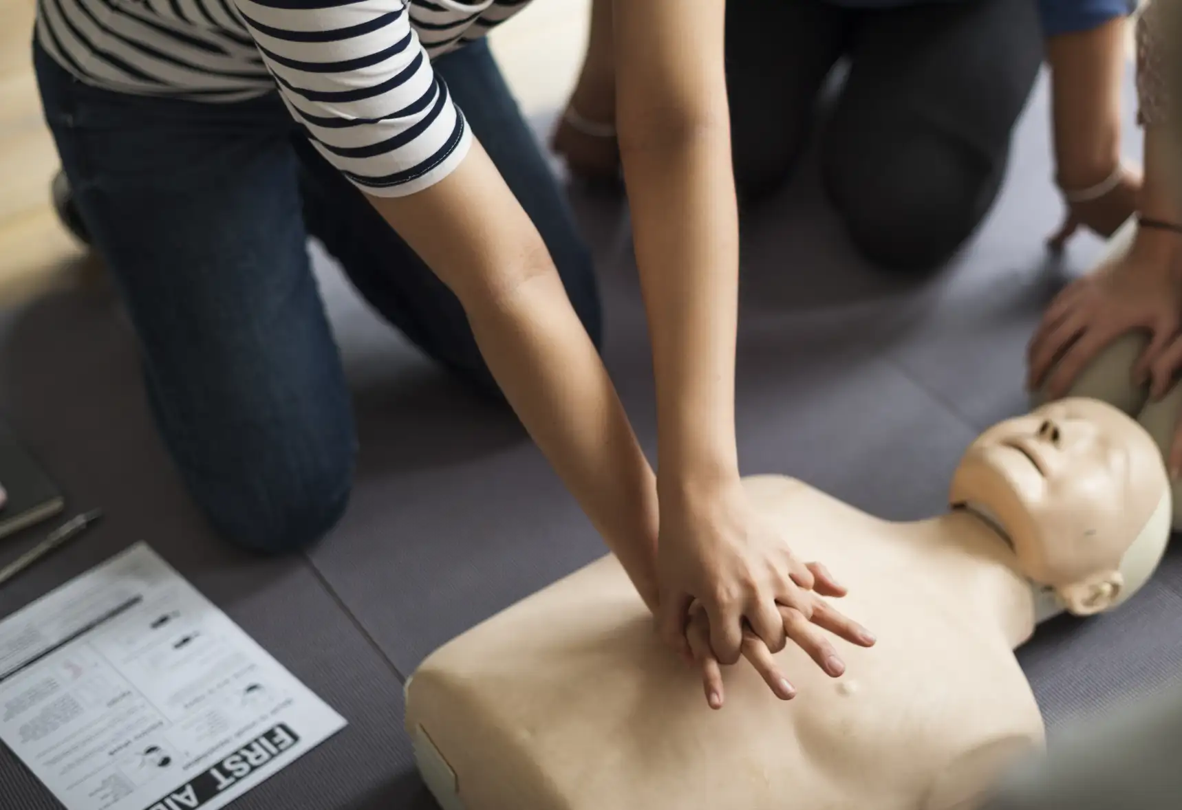 An image of a person performing CPR